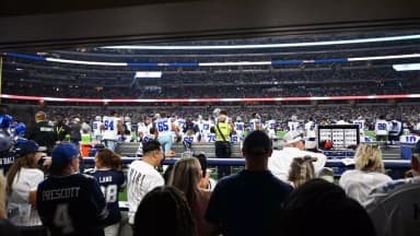 View of the Dallas Cowboys bench from the Miller Lite Club. Field Suites on the Visitors side have access to the DraftKings Lounge with the same experience.