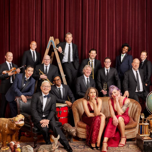 Pink Martini suites and premium seating
