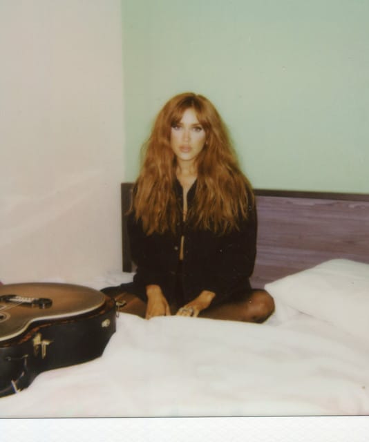 Laci Kaye Booth suites and premium seating