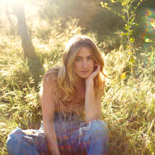 Ingrid Andress suites and premium seating